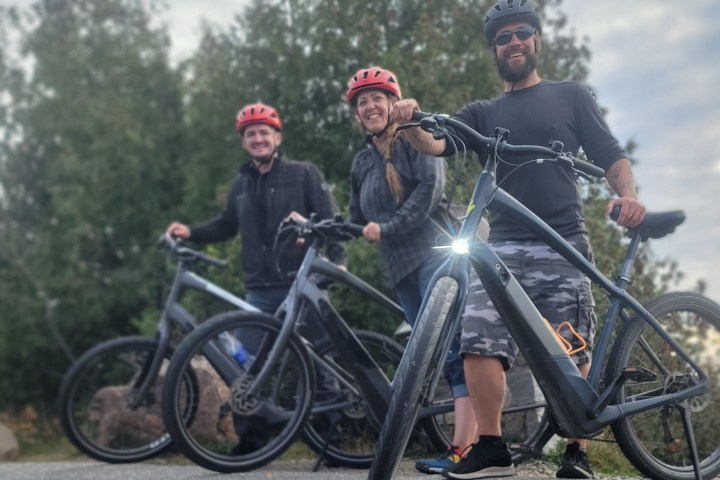 a man riding on the back of a bicycle